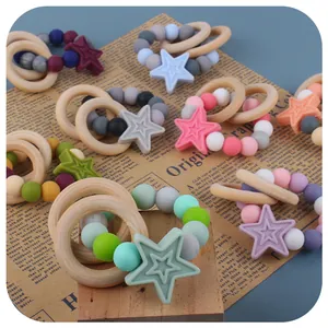 Baby silicone teething bracelet with natural wooden rings and star pendant in multiple colors