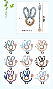 Guide des tailles détaillé et collection multicolore d'attache-tétines faits main en hêtre