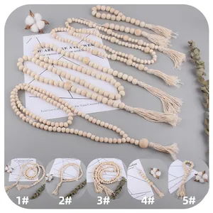 Creative wooden bead garland with cotton tassels and smiley face charms for home decor