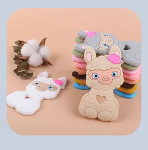 Detail of baby sheep silicone teether toys in multiple colors with hollow heart design