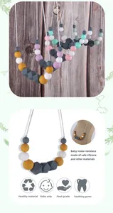 Detailed view of BPA-free silicone teething necklace for infants with multi-colored beads
