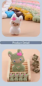 Detailed macro of colorful sheep-shaped silicone beads and heart-shaped baby teether