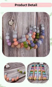 Detail of silicone and wooden beads teething necklace for baby sensory chew