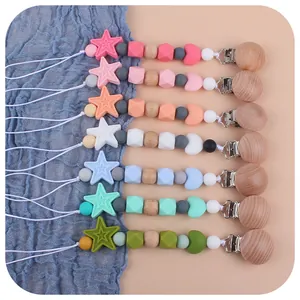 Silicone pacifier clip set with star and moon beads for baby safety in pastel colors