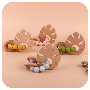 Kit d'anneaux de dentition en silicone et hêtre avec feuilles en quatre couleurs