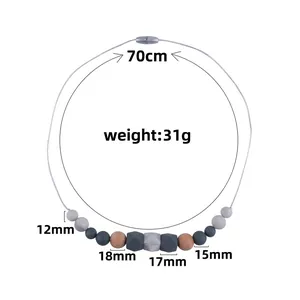 Silicone and wood teething necklace for babies with grey and geometric beads, 70cm length