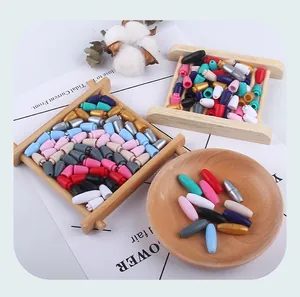 Detailed view of multi-color plastic breakaway safety clasps for DIY necklaces and crafts