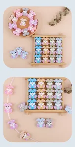 Macro detail of colorful rabbit silicone beads for DIY baby pacifier chains and teethers