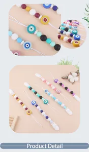 Detail of colorful silicone evil eye teething beads and plastic clip for baby pacifier chain