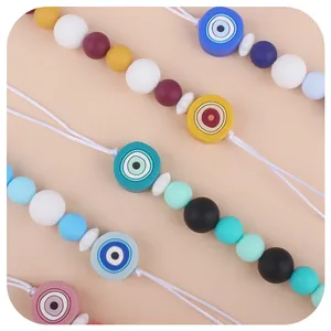 Colorful silicone pacifier clip with Evil Eye beads and food-grade round teething beads
