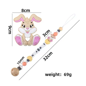 Silicone baby pacifier clip and pink rabbit teether set with customizable name beads