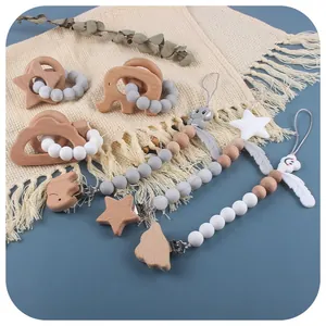 Baby Beißring Set aus Silikon und Buchenholz mit Schnullerkette und Elefanten Motiv