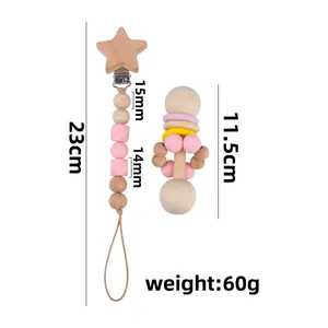 Chupetero de silicona rosa y madera con sonajero de estrella para bebés y recién nacidos