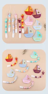 Detail of sailboat silicone teether and colorful pacifier clip chain for infants