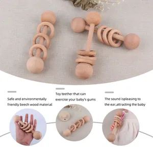 Handcrafted beech wood baby rattle and teething ring for infant sensory development