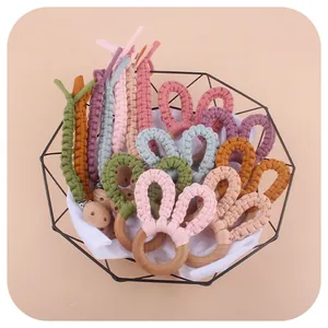 Handmade macrame baby pacifier clip and beech wood teether set in Morandi colors
