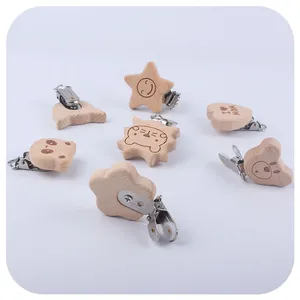 Beech wood baby pacifier clips in various animal and star shapes for DIY chains