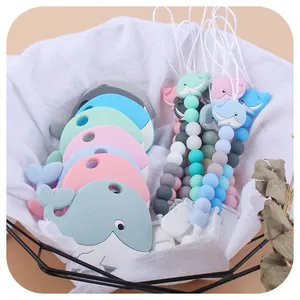 Set mordedor de silicona ballena con cadena de chupete de cuentas en tonos pastel