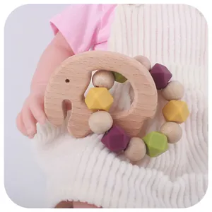 Baby Beißring aus Buchenholz in Elefantenform mit bunten Silikonperlen für Kleinkinder