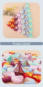 Detailed view of colorful sailboat-shaped silicone teething beads for baby DIY crafts