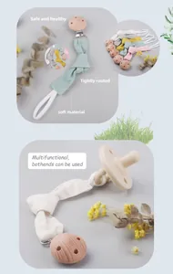 Detail eines Schnullerketten-Clips aus Buchenholz mit Leinenband in sanften Pastellfarben