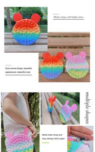 Detail of Mickey-shaped silicone pop-it shoulder bag with rainbow colors and metal chain