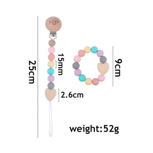 Silicone and wood baby pacifier clip set with heart motif and 25cm length dimension