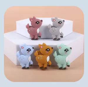 Detailed view of colorful silicone deer charms for DIY pacifier clips and accessories