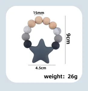Detail of 9cm baby teething ring with 15mm beech wood beads and grey silicone star pendant