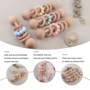 Baby beech wood rattle and silicone bead teether set with pacifier in macabre colors