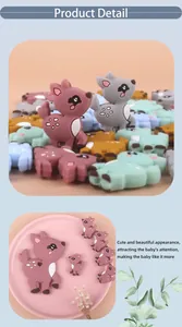 Detail view of colorful deer-shaped silicone teething beads for baby DIY pacifier chains