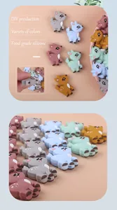 Macro shot of colorful deer-shaped food-grade silicone beads for DIY pacifier chains