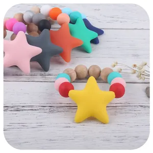 Star-shaped silicone and beech wood baby teether with colorful DIY beads for soothing