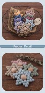 Detailansicht des Beißring-Sets aus bunten Silikonperlen und Naturholz für Babys