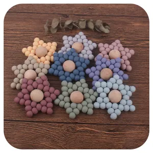 DIY blumenförmige Baby-Beißringe aus Silikon und Holz in neun Morandi-Farben