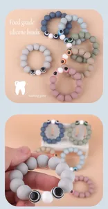 Macro detail of food grade silicone teething rings in various Morandi colors for babies