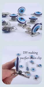 Blue Evil Eye metal clip for DIY baby pacifier chains showing clamp detail