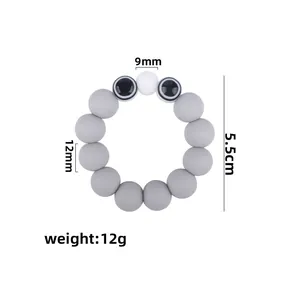 Grey silicone baby teething ring with cute white eye beads, 5.5cm diameter sensory toy