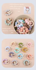 Macro detail of food-grade silicone beads and natural beech wood rings for baby teething