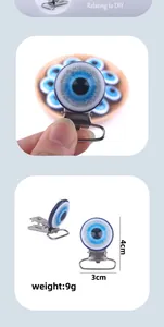Detail of blue evil eye pacifier clip with glitter finish and size dimensions