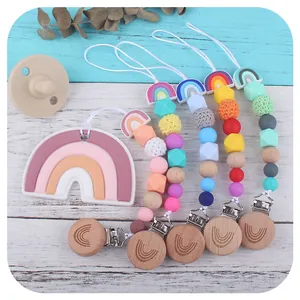 Rainbow silicone pacifier clips set with wooden beads and rainbow shaped baby teether