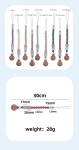 Silicone and beech wood baby pacifier clip collection in nine soft Morandi colors