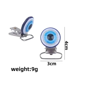 Blue Evil Eye pacifier clip accessory with glitter border and metal secure clip 4cm