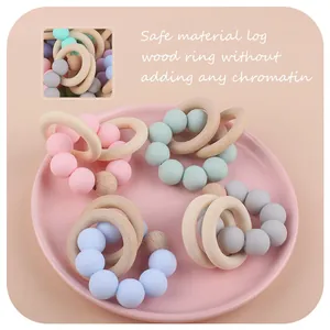 Silicone and beech wood baby teething ring set with movable natural wooden charms