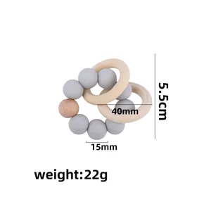 Beech wood and silicone baby teething ring with dimensions and 22g weight specs