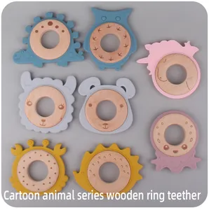 Detailed set of eight silicone and beech wood baby teethers with various animal shapes
