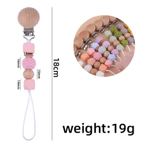 Spécifications de taille pour attache-tétine en silicone rose et bois de hêtre