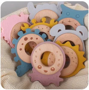 Detailed view of colorful animal silicone baby teethers with natural beech wood rings