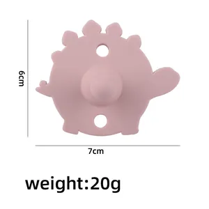 Rosa Silikon Beißring in Dinosaurier-Form für Babys mit 7cm Breite und 6cm Höhe Maßen