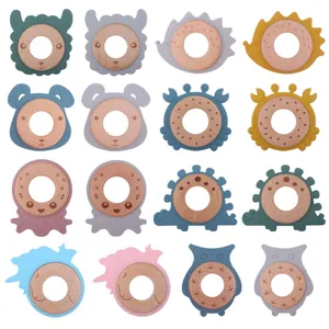 Grid display of 16 colorful silicone and beech wood animal teethers for infants